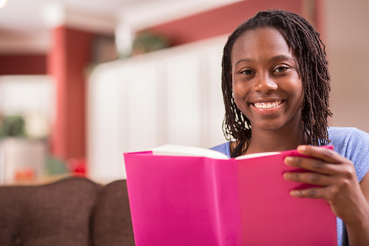 Girl reading a book.