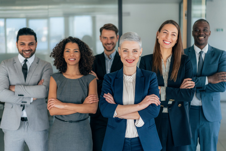 Business people standing next to each other