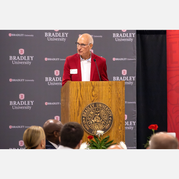 Craig A. Thompson ‘74 at podium