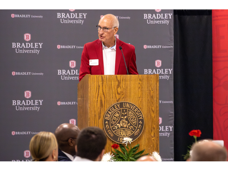 Craig A. Thompson ‘74 at podium